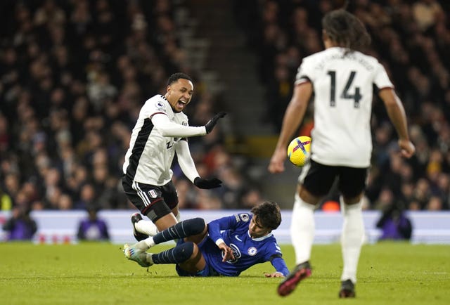 Chelsea’s Joao Felix fouls Fulham’s Kenny Tete