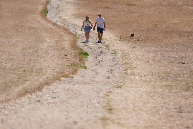 People walking through Primrose Hill, north London