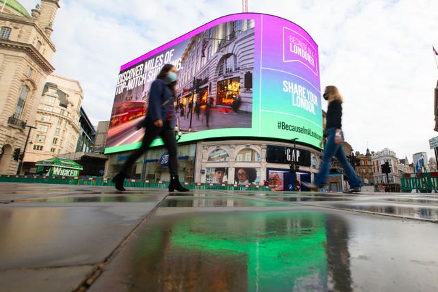 Pink and green lights in Piccadilly