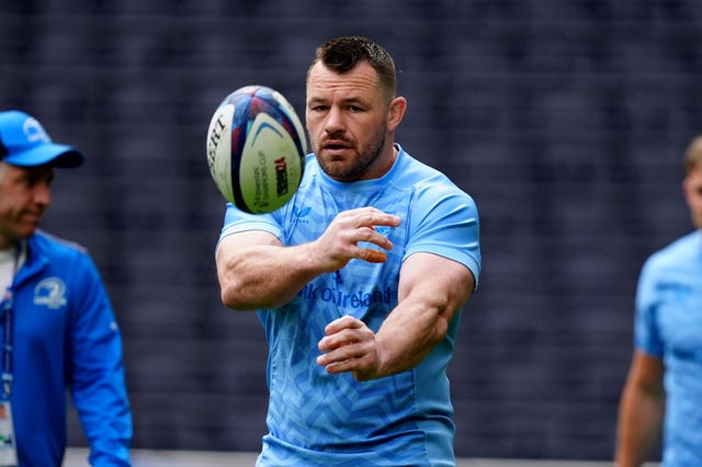 Cian Healy passes the ball during a Leinster training session