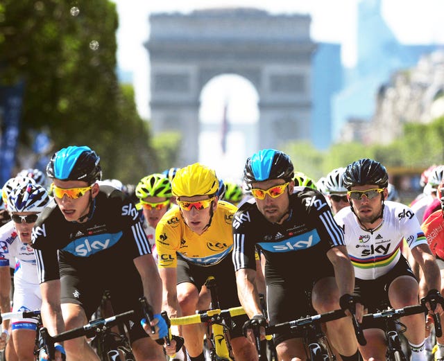 Bradley Wiggins, wearing yellow jersey, rides with team-mates Mark Cavendish, Christian Knees and Bernhard Eisel during Stage 20 of the 2012 Tour de France