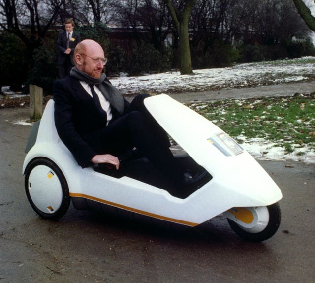 Sir Clive Sinclair in a C5
