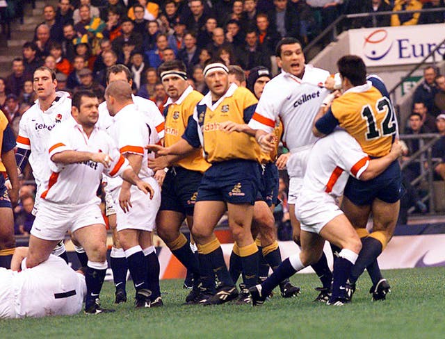 England's Martin Johnson (right) comes to blows with Australia's Nathan Gray as their respective teams meet at Twickenham in 1998