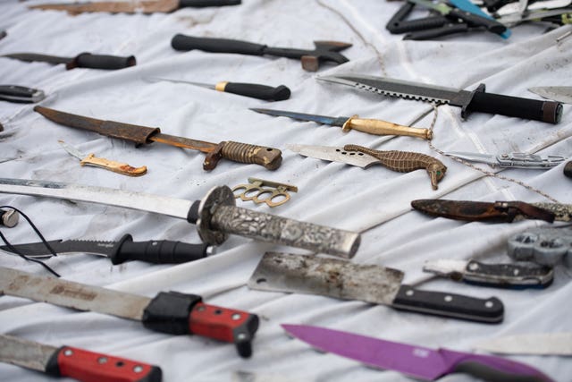 Knives and other weapons that have been deposited into weapon surrender bins