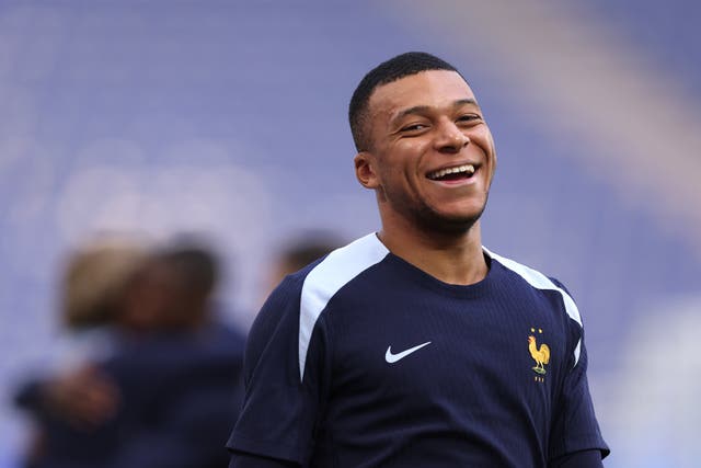 France’s Kylian Mbappe smiles during a training session at Euro 2024