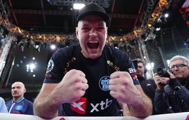 Tyson Fury celebrates victory against Arslanbek Makhmudov 