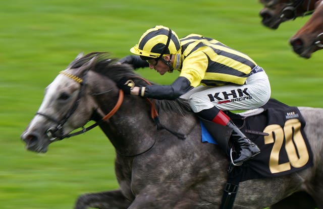 True Cyan winning on debut at Newmarket 