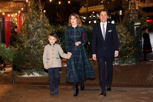 Wolfie holding hands with Princess Beatrice as they arrive with Edoardo Mapelli Mozzi at the Princess of Wales's Together At Christmas service at Westminster Abbey in 2023 