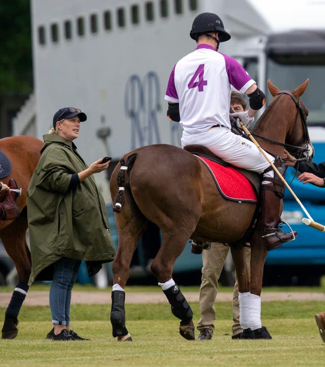 Zara Tindall, left, with the Duke of Cambridge (Steve Parsons/PA)