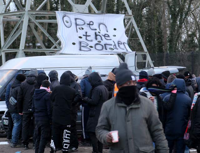 Migrants in Calais, where the French President visited on Tuesday (Gareth Fuller/PA)