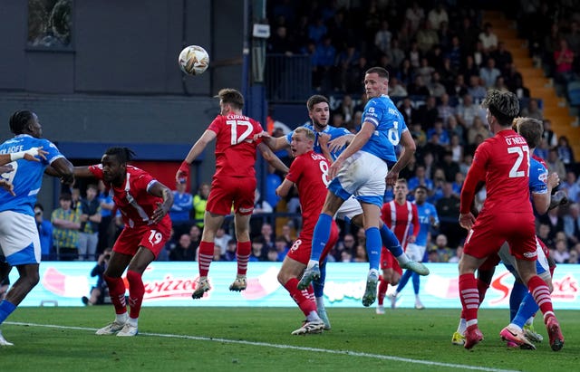 Fraser Horsfall heads the ball