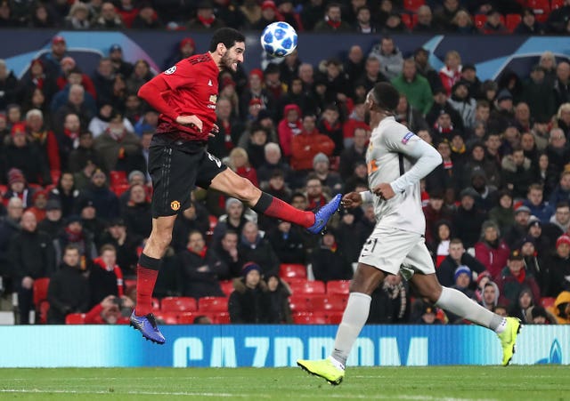 Marouane Fellaini scored a last-gasp winner for United against Young Boys to seal their place in the Champions League knockout stages