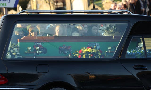 The coffin arrives at St Malachy’s Church