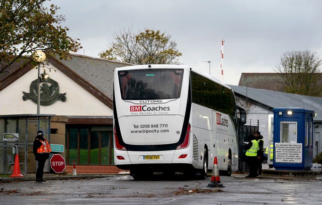 A coach arrives at the Manston immigration short-term holding facility 