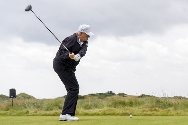 Donald Trump playing golf