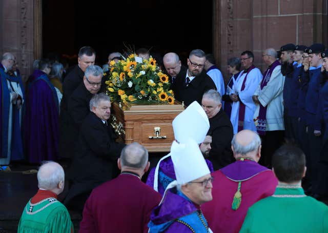 Sir Ken Dodd’s coffin is carried out of Liverpool Anglican Cathedral (Peter Byrne/PA)