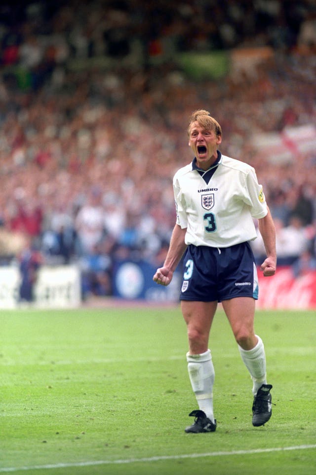 Stuart Pearce celebrates scoring in the penalty shoot-out against Spain at Euro 96