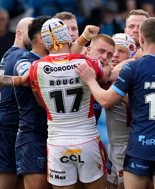 Mikey Lewis (centre right) and Cesar Rouge (centre left) clash