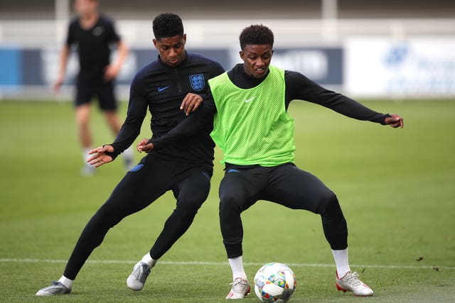 Marcus Rashford, left, during a training session at St George's Park