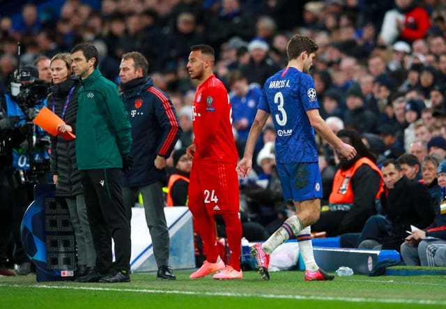 Chelsea’s Marcos Alonso leaves the pitch after being shown a red card