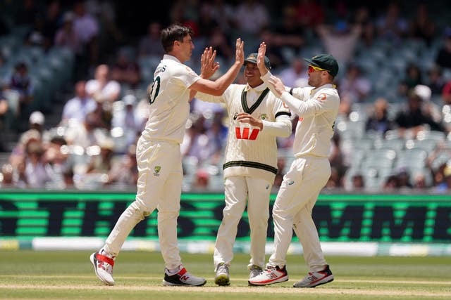 Australian players celebrate their Ashes win in Adelaide.