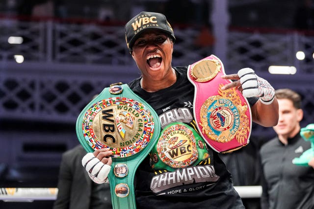 Caroline Dubois celebrates winning the WBC and WBO world lightweight titles