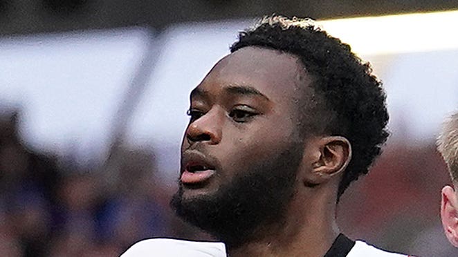 Portsmouth’s Abu Kamara (left) won the game (PA)