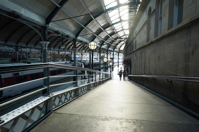 Passengers at Newcastle station, as train services continue to be disrupted following the nationwide strike by members of the Rail, Maritime and Transport union in a bitter dispute over pay, jobs and conditions