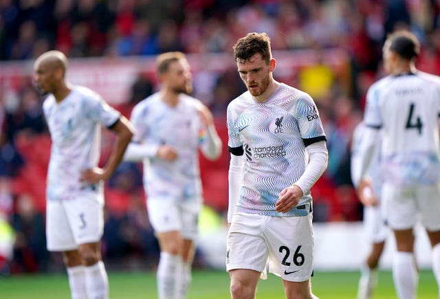 Liverpool players look dejected after conceding in their defeat at Nottingham Forest