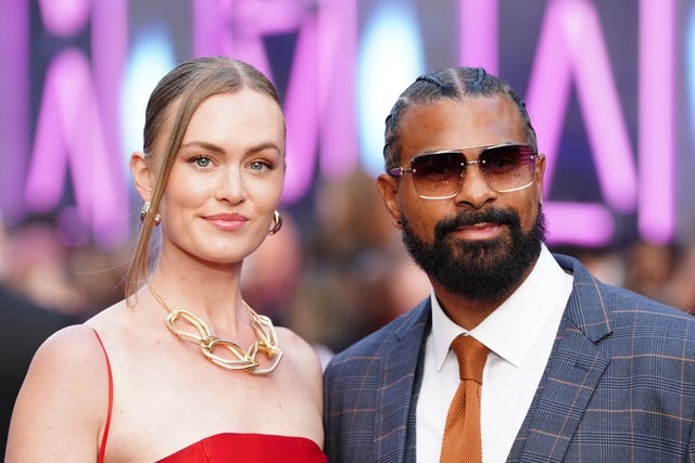 David Haye and Sian Osbourne posing for photos at a red carpet event