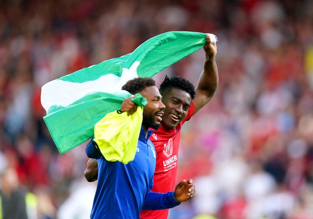 Goalscorer Taiwo Awoniyi, right, celebrates after Nottingham Forest secured their Premier League status