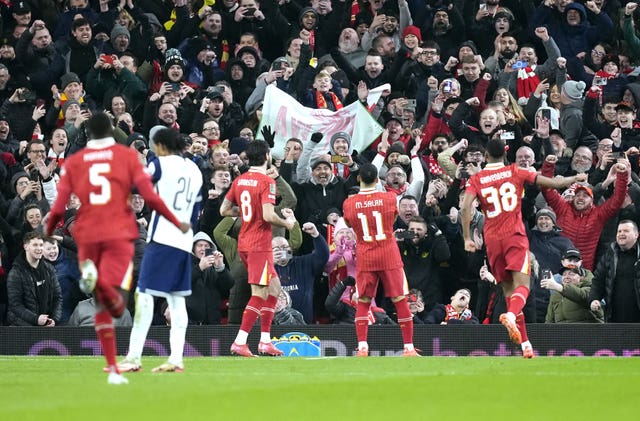 Liverpool’s Mohamed Salah (second right) celebrates scoring