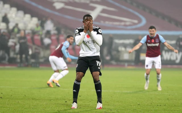 Fulham forward Ademola Lookman covers his face in disbelief after dramatically fluffing a Panenka-style penalty. The poorly-executed spot-kick was the final action of a 1-0 defeat at West Ham in November. Scott Parker's Cottagers endured a disappointing season following promotion, with their relegation back to the Sky Bet Championship confirmed with three games remaining
