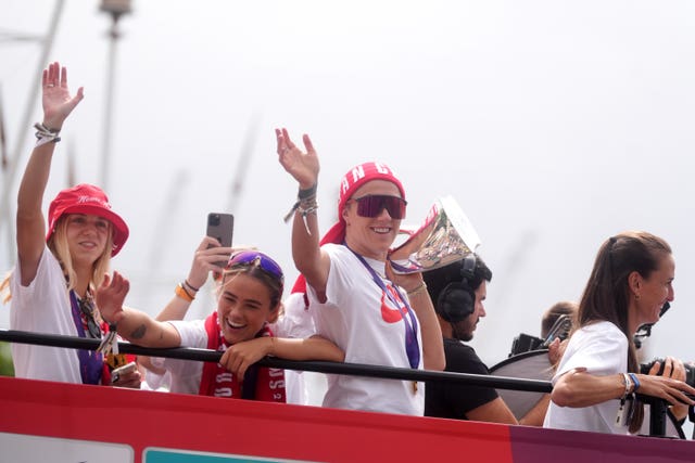 England’s Lucy Bronze waves from the bus