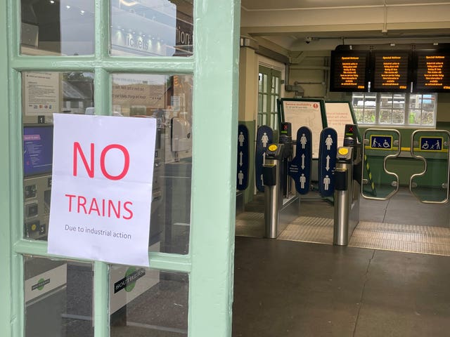 Signs at a closed train station in West Sussex