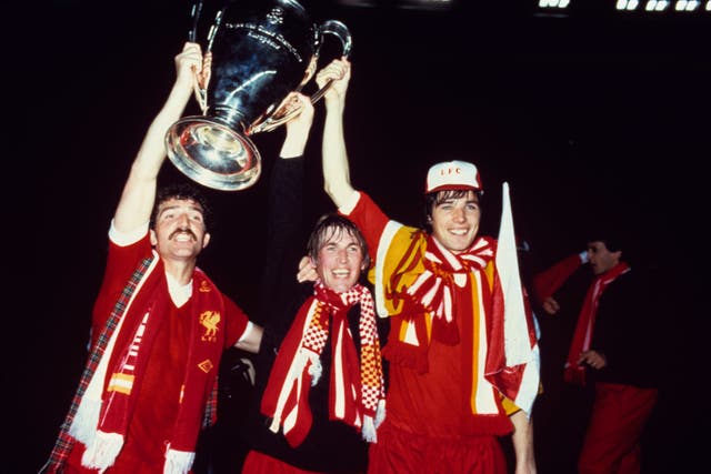 Kenny Dalglish, centre, celebrates his second European Cup win with Liverpool after the Reds beat Real Madrid in 1981