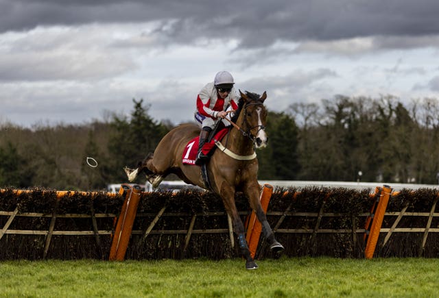 Goshen ridden by jockey Jamie Moore goes onto win the Virgin Bet Contenders Hurdle at Sandown Park racecourse last year 