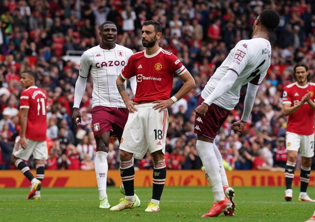 Bruno Fernandes reacts to his penalty miss last season as Aston Villa players celebrate