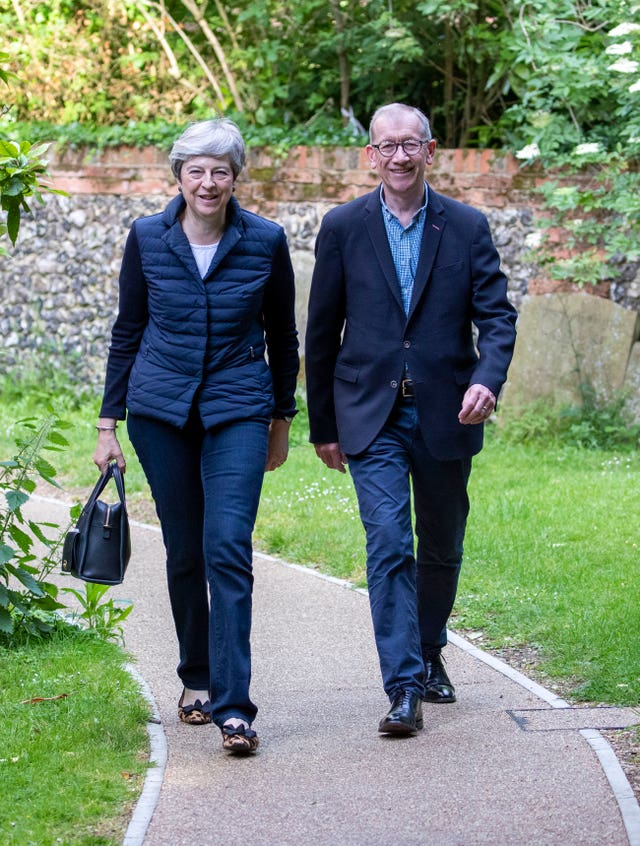 Theresa May attends church