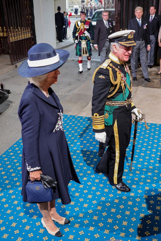 The Prince of Wales and the Duchess of Cornwall arrive at the Sovereign’s Entrance to the Palace of Westminster ahead of the State Opening of Parliament in the House of Lords, London