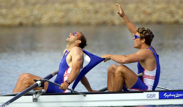 Redgrave, left, wins gold in the coxless fours at the Sydney Olympics