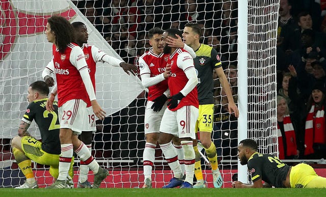 Alexandre Lacazette (9) celebrates scoring the Gunners' last-gasp equaliser