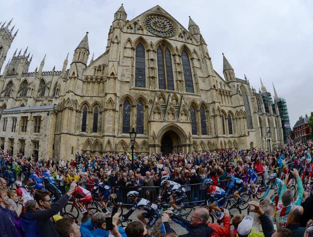 The Tour de France Peloton passes York Minster in 2014