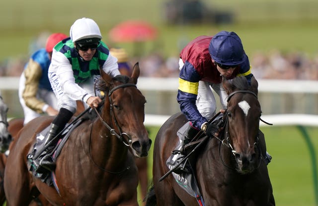 Porta Fortuna (right) winning the Cheveley Park Stakes at Newmarket