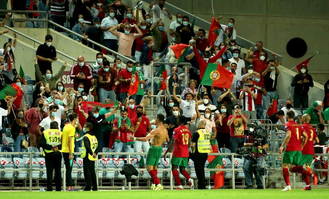 Portugal's Cristiano Ronaldo (centre) celebrates scoring his injury-time winner against the Republic of Ireland