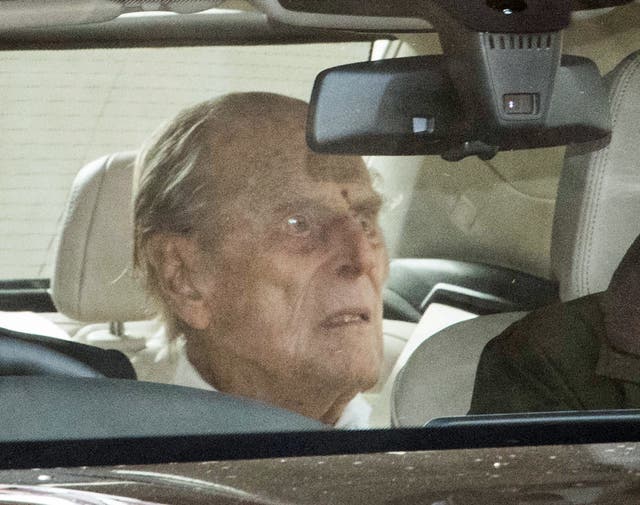 The Duke of Edinburgh is driven away in a car after leaving the King Edward VII’s Hospital, London