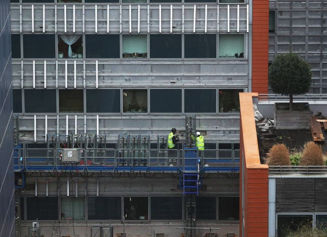 Contractors undertake works at a residential property in Paddington to remove cladding