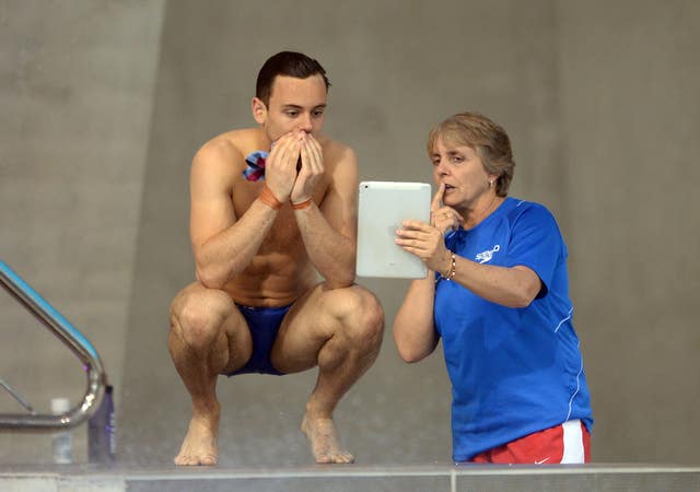 Great Britain’s Tom Daley with his coach Jane Figueiredo during day one of the FINA Diving World Series Event at The Aquatics Centre, London