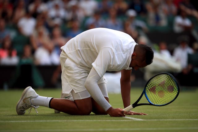 Nick Kyrgios on the floor during his gruelling match in 2019 