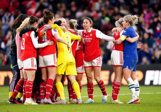 England team-mates Leah Williamson of Arsenal and Chelsea’s Millie Bright embrace at the end as Arsenal players celebrate